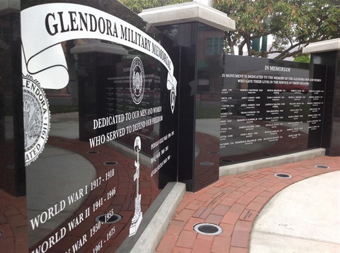 Photo of the black stone inscribed with the names and dates of the people and wars memorialized at the Glendora Military Memorial.JPG