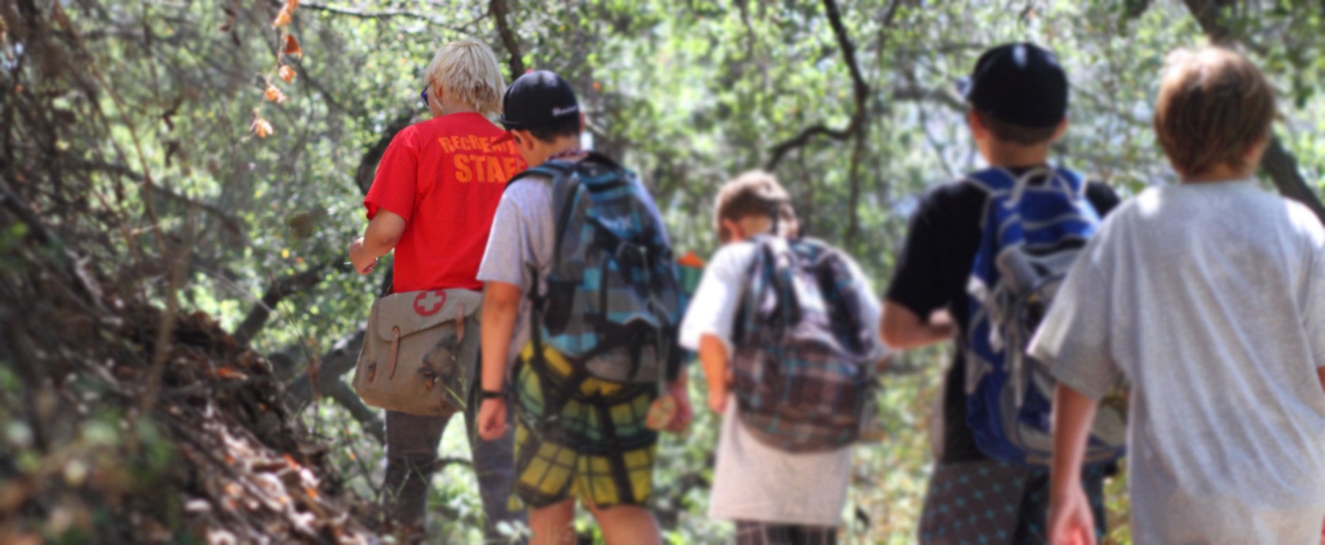 a-recreation-volunteer-leads-teens-through-the-big-dalton-wilderness-during-summer-dirt-camp.jpg